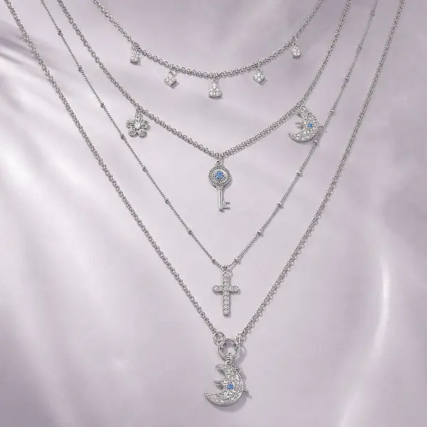 Product detail of the AOI celestial layered charm necklace