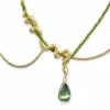ISLA olive green teardrop serpent necklace on a white background