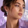 Gen Z model wearing Celestial Starburst Hoop Earrings | Silver-Tone Pavé Drop Earrings