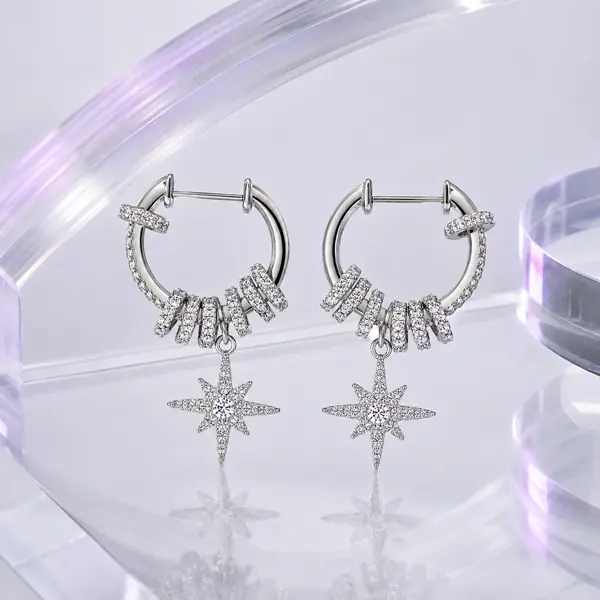 Celestial Starburst Hoop Earrings | Silver-Tone Pavé Drop Earrings in a silver chrome Y3K editorial setting