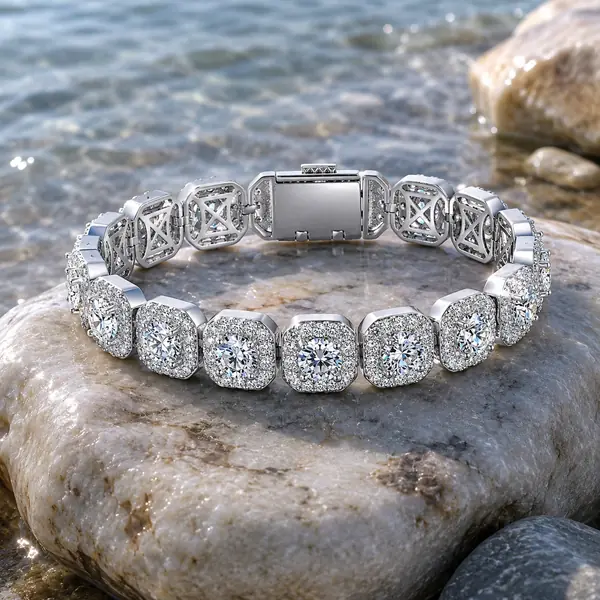 RHEA cushion halo bracelet in a natural coastal jewelry editorial
